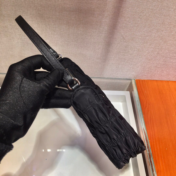 Pra*a nylon and saffiano leather mini bag