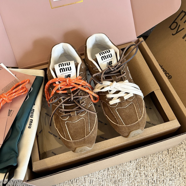 M*um*u x new balance sneaker