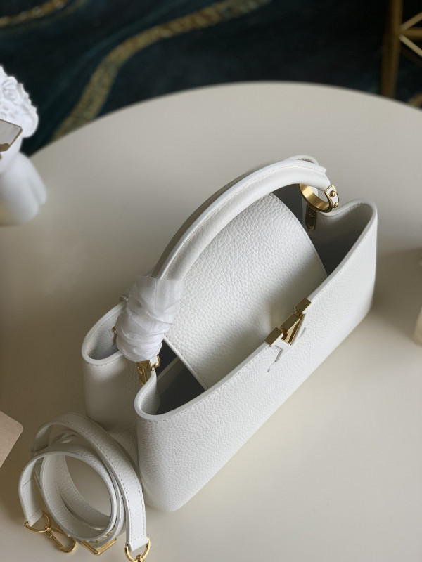 l0*is V*t0n capucines pm